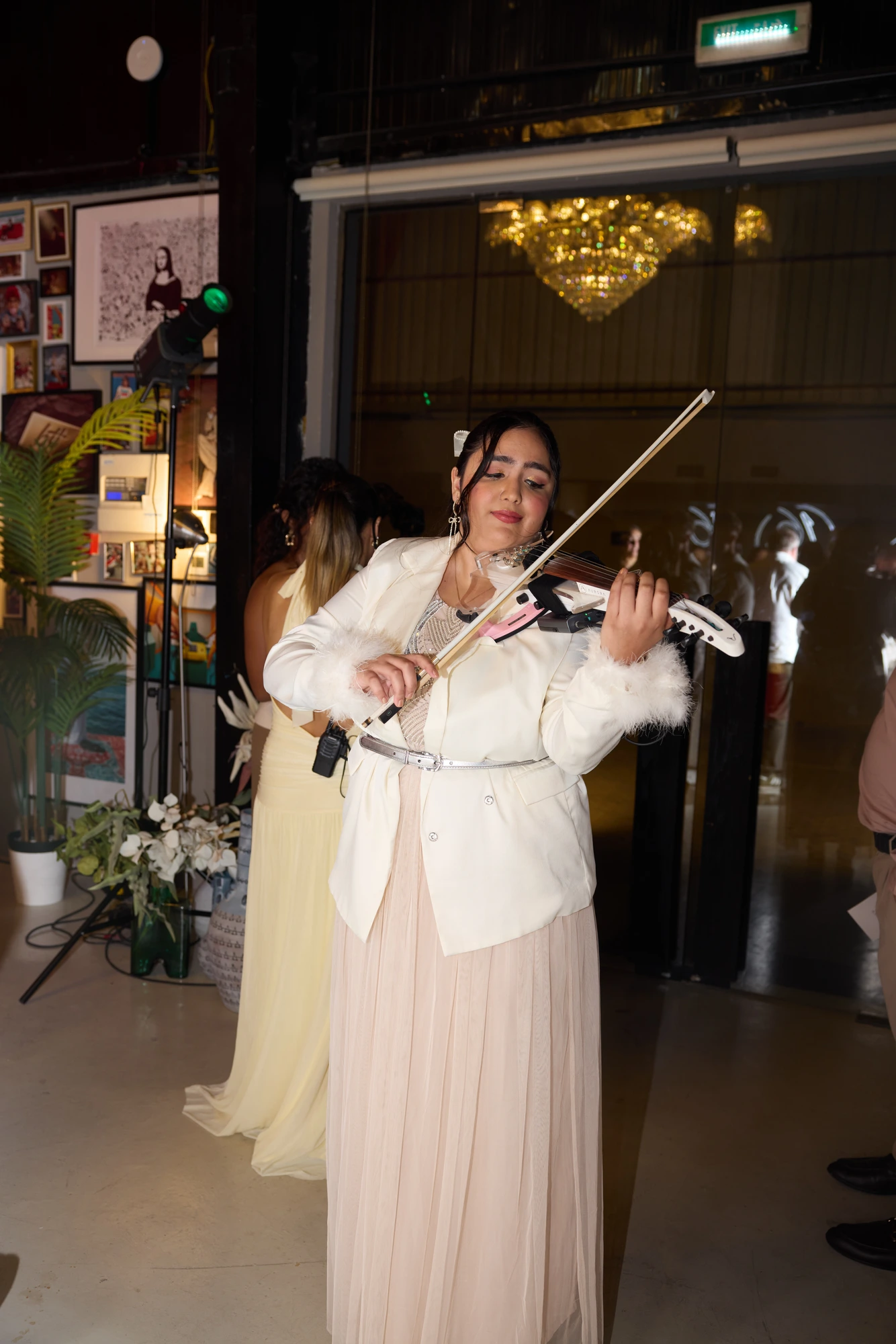 Live violin performance during a celebration at BTT Creative Hub
